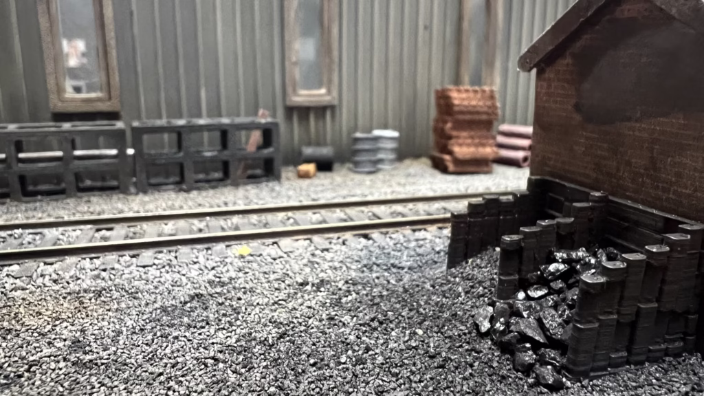 Photo of a HO Scale 3D printed model of a coal bunker coal staithes for a model railroad