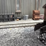 Photo of a HO Scale 3D printed model of a coal bunker coal staithes for a model railroad