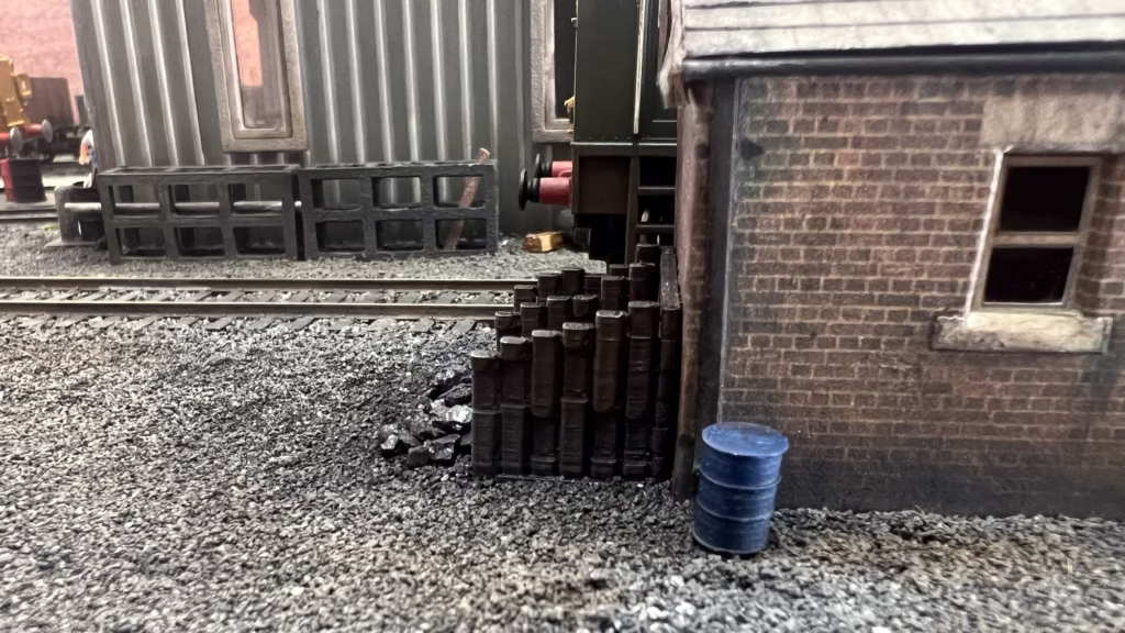 Photo of a HO Scale 3D printed model of a coal bunker coal staithes for a model railroad