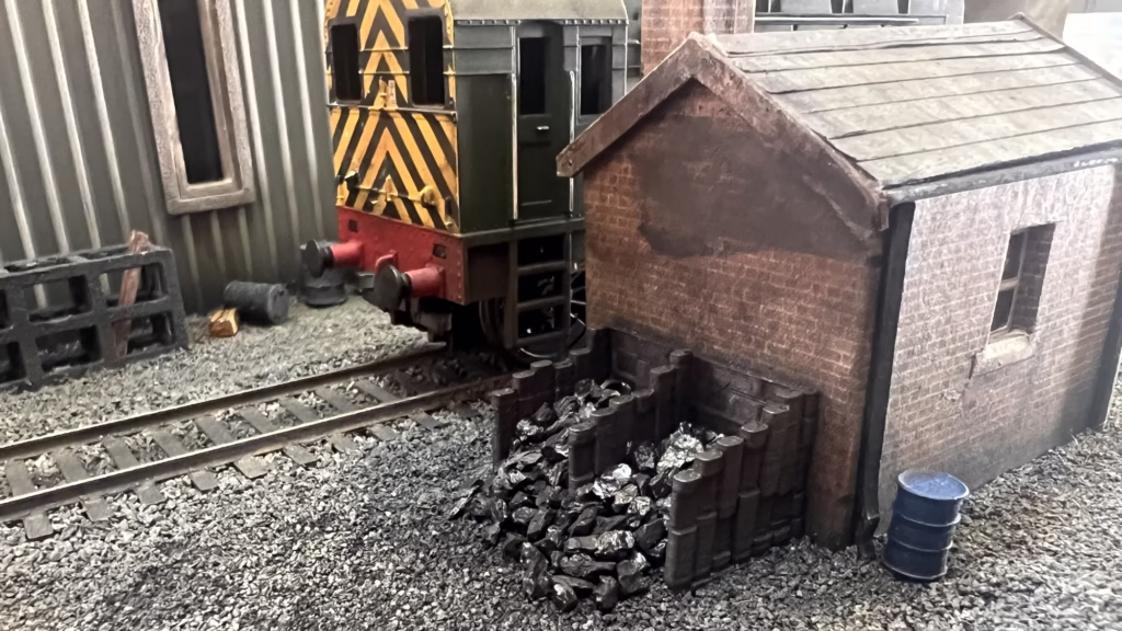 Photo of a HO Scale 3D printed model of a coal bunker coal staithes for a model railroad