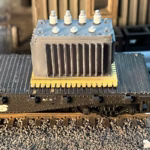 Photo of an HO Scale 3D printed model of a large electrical transformer for a model railroad