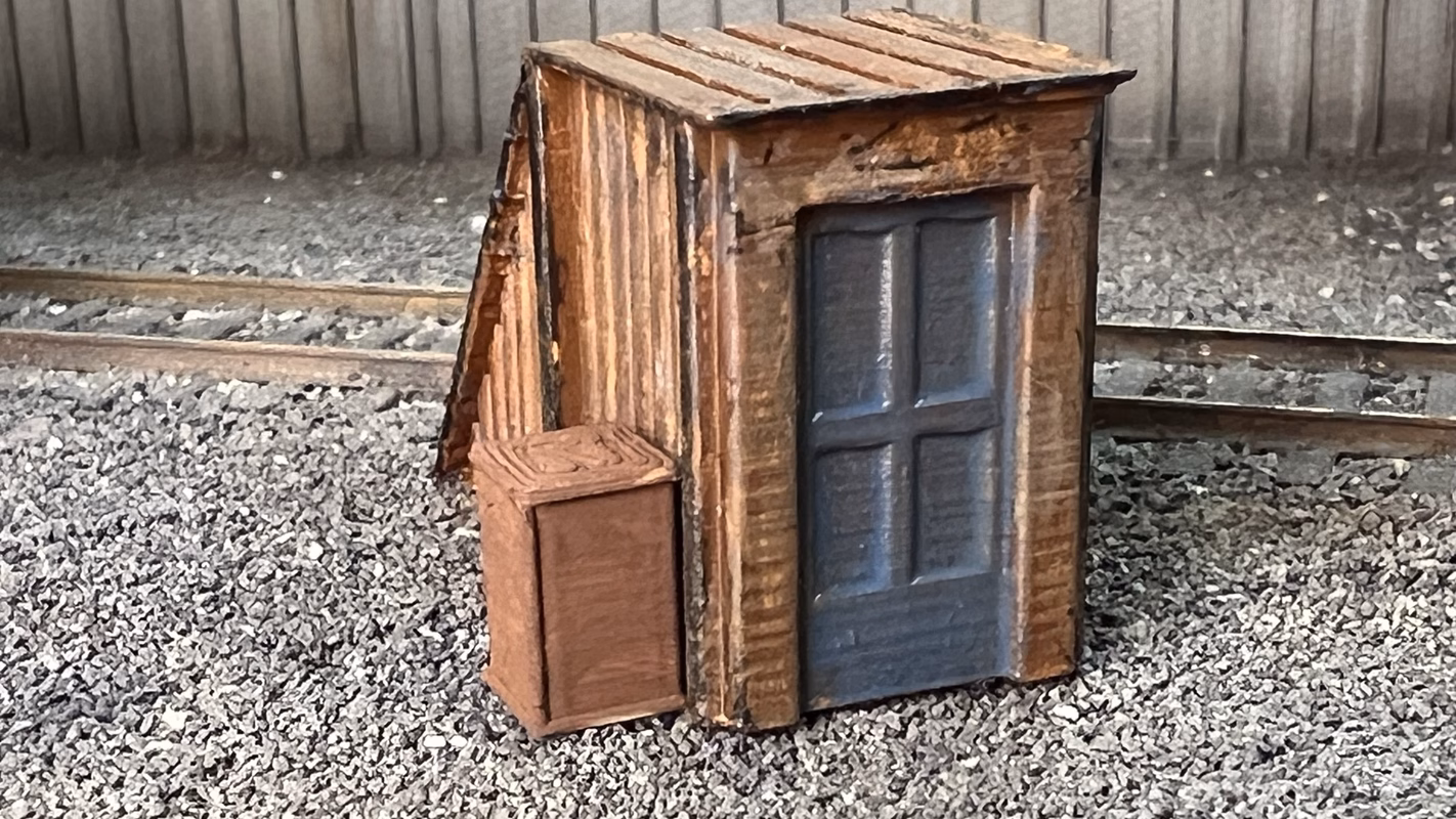 Photo of an HO Scale 3D printed model of rooftop stairs for a model railroad