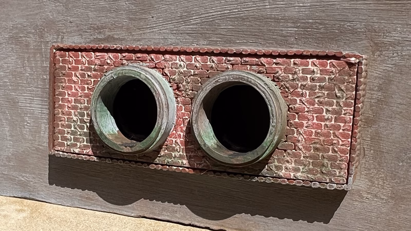 Photo of a HO Scale 3D printed model of a waste water drain outlet in brick for a model railroad