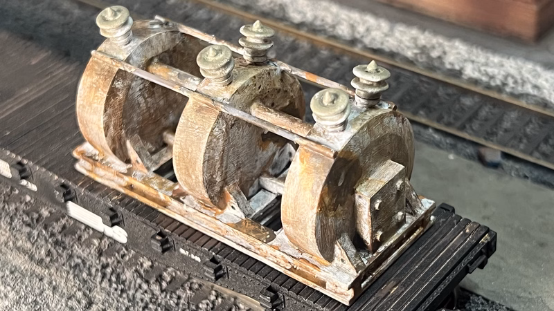 Photo of an HO Scale 3D printed model of a large electrical transformer for a model railroad