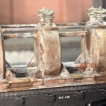 Photo of an HO Scale 3D printed model of a large electrical transformer for a model railroad