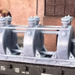 Photo of an HO Scale 3D printed model of a large electrical transformer for a model railroad