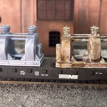 Photo of an HO Scale 3D printed model of a large electrical transformer for a model railroad