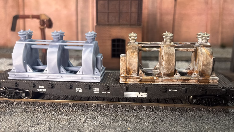 Photo of an HO Scale 3D printed model of a large electrical transformer for a model railroad