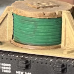 Photo of an HO Scale 3D printed model of a cable drum on a pallet for a model railroad