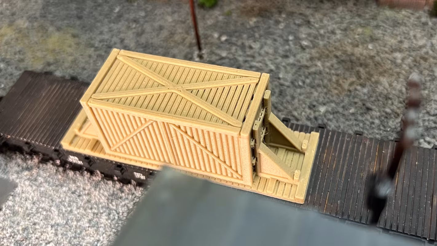 Photo of an HO Scale 3D printed model of large box crates for a model railroad similar to Chooch