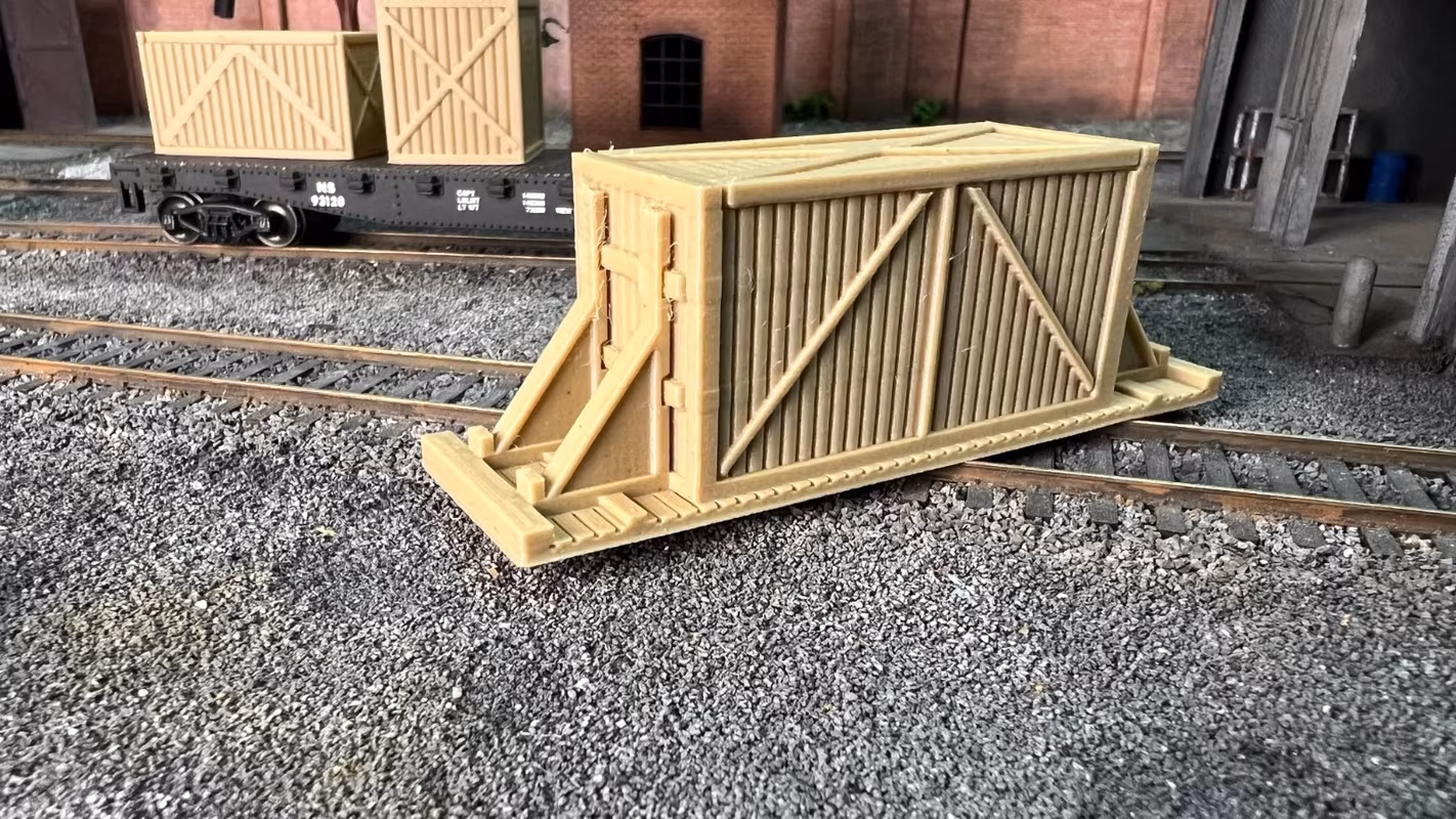 Photo of an HO Scale 3D printed model of large box crates for a model railroad similar to Chooch