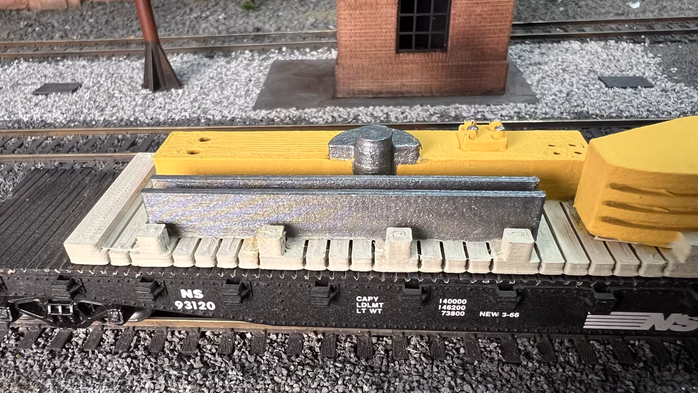 Photo of a HO Scale 3D printed model of an oil pump on a pallet for a model railroad
