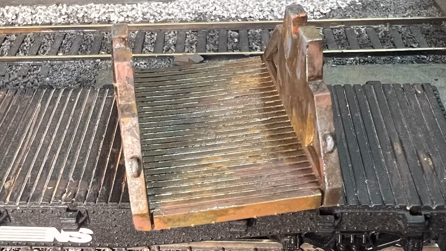 Photo of an HO Scale 3D printed model of a steel mill ladle on a pallet for a model railroad