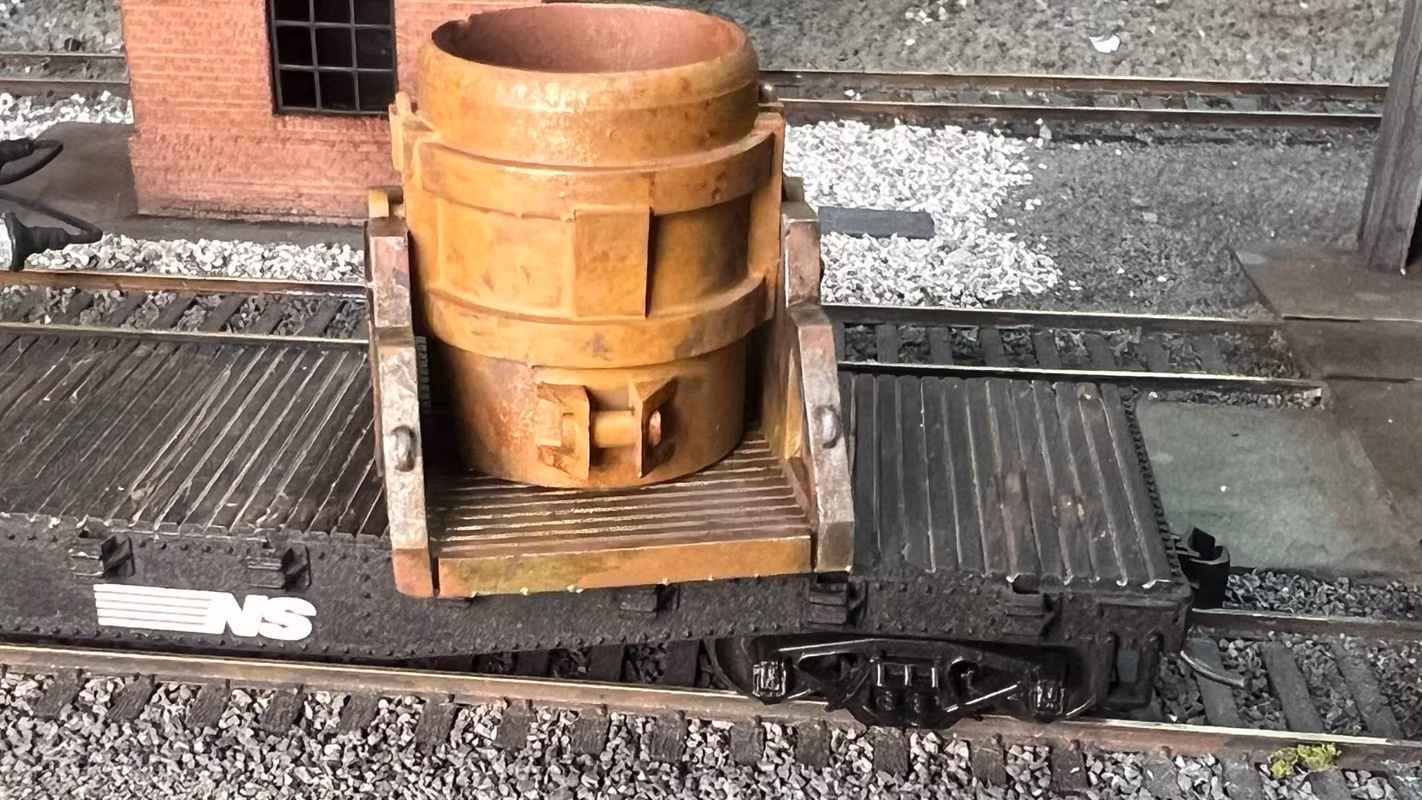 Photo of an HO Scale 3D printed model of a steel mill ladle on a pallet for a model railroad