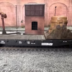 Photo of an HO Scale 3D printed model of a steel mill ladle on a pallet for a model railroad