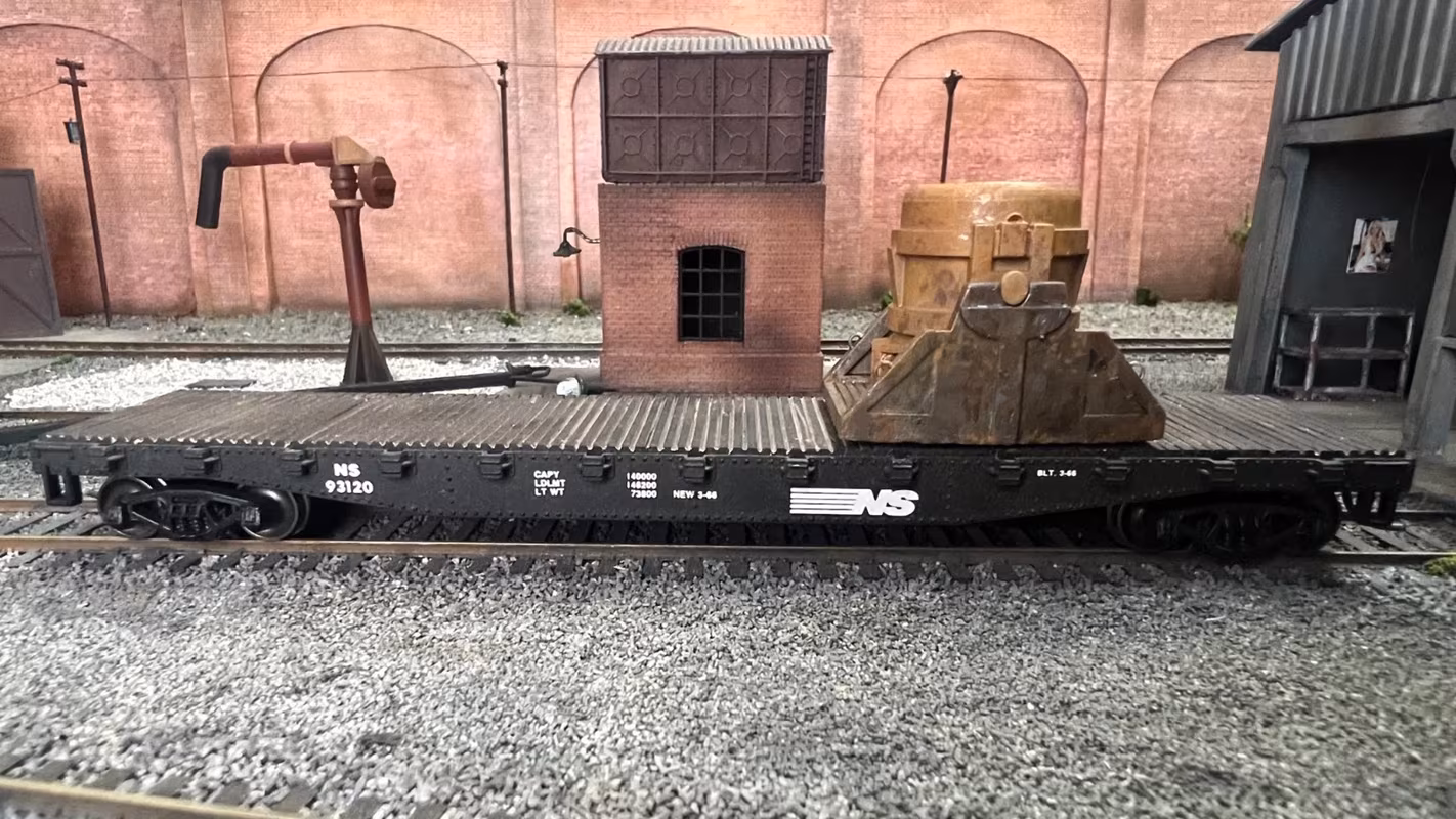 Photo of an HO Scale 3D printed model of a steel mill ladle on a pallet for a model railroad