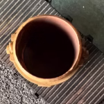 Photo of an HO Scale 3D printed model of a steel mill ladle on a pallet for a model railroad