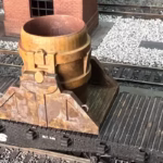 Photo of an HO Scale 3D printed model of a steel mill ladle on a pallet for a model railroad