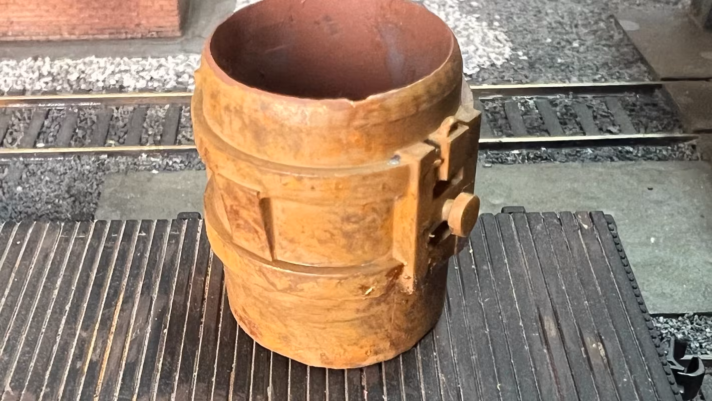Photo of an HO Scale 3D printed model of a steel mill ladle on a pallet for a model railroad