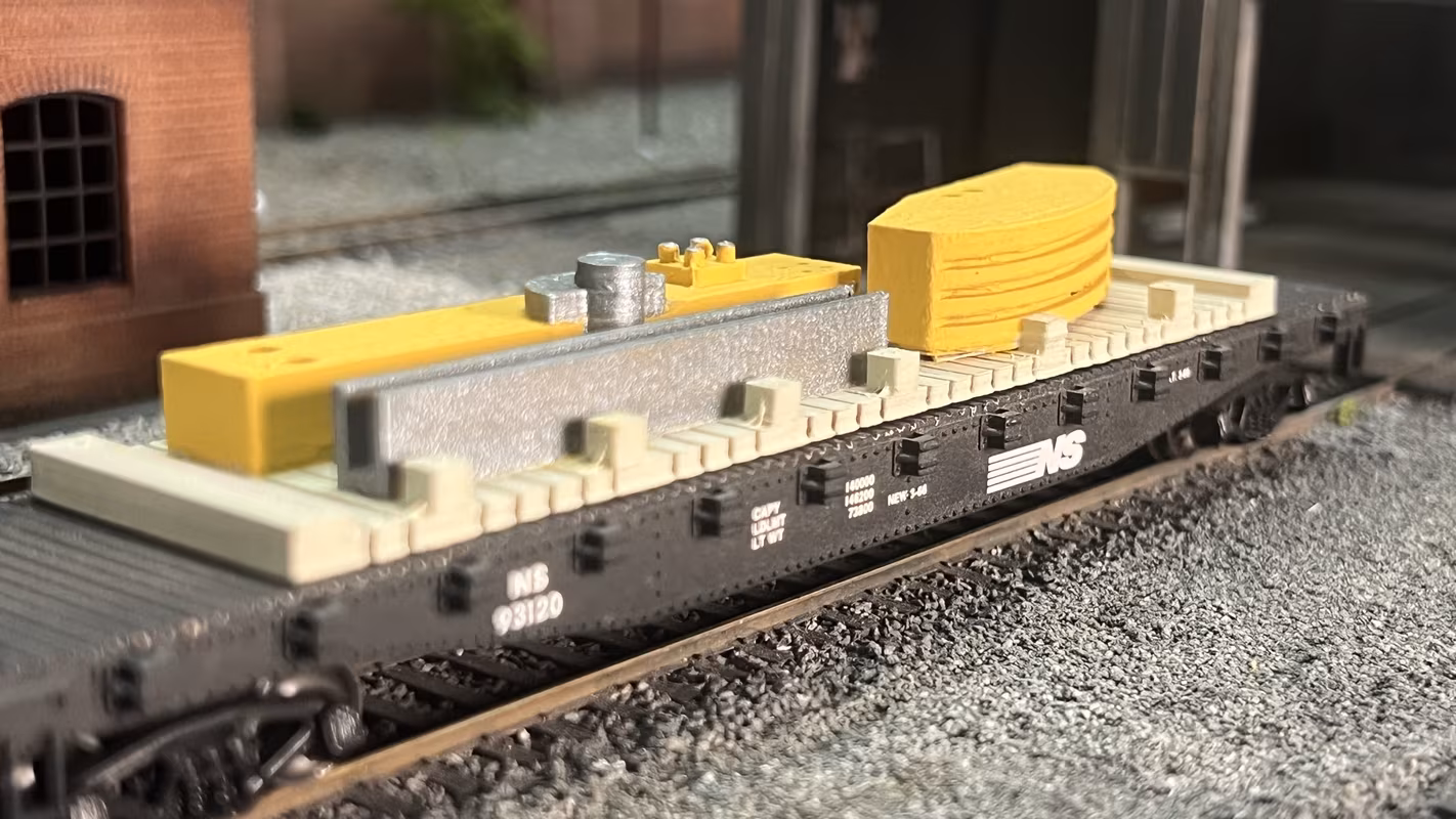 Photo of a HO Scale 3D printed model of an oil pump on a pallet for a model railroad