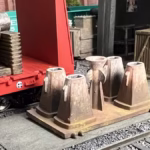 HO Scale Steel Mill Bottom Pour Ingot Mold on Flat Car Close Up View In Yard With Rail Car