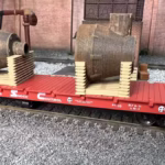 HO scale steel mill furnace hood on pallet with real rust detail on rail car