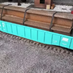 HO Scale steel mill H beam flat car load in gondola top view with real rust