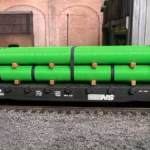 HO scale large pipe car load green side view - ScaleRail3D